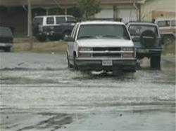 Stormwater-Car Going thru Water